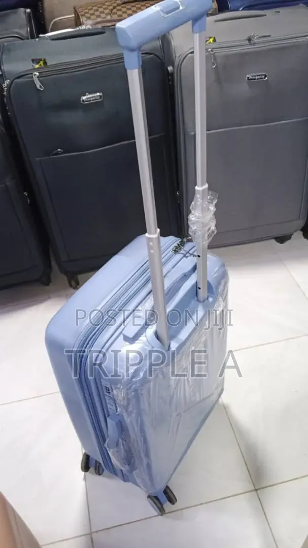 Light Blue Small Hard-Shell Trolley Suitcase - 1