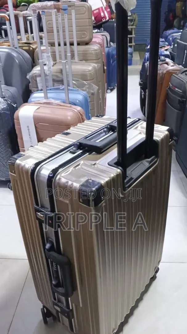 Gold Hard-Shell Spinner Suitcase - 1