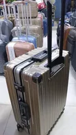 Gold Hard-Shell Spinner Suitcase - 1