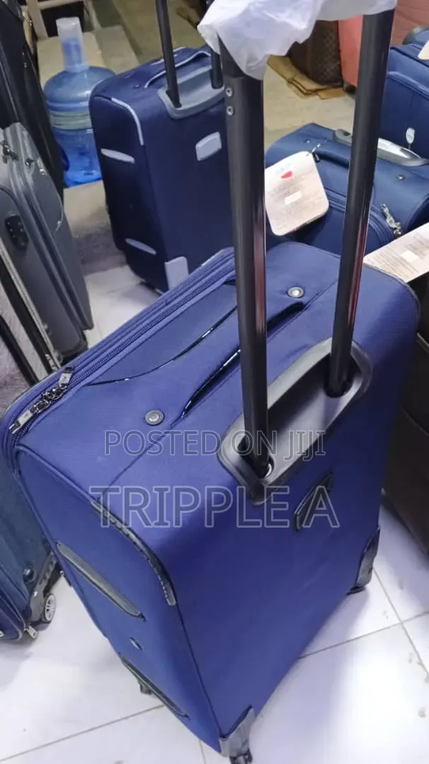 Medium Size Blue Soft-Shell Fabric Suitcase - 1