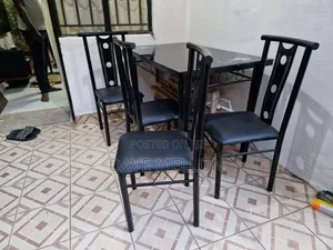 Imported Glass-Top Dining Table - 4 Seater