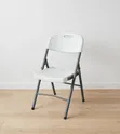 White Foldable Plastic Chairs with Metal Frame - 1