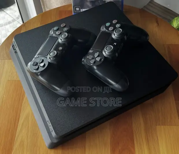 PS4 Slim Console with 12 Games & 2 Controllers - 1