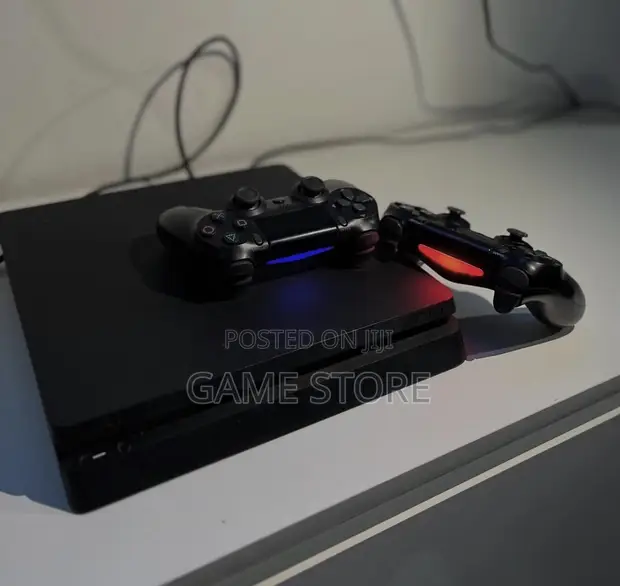 PS4 Slim Console with 12 Games & 2 Controllers - 1