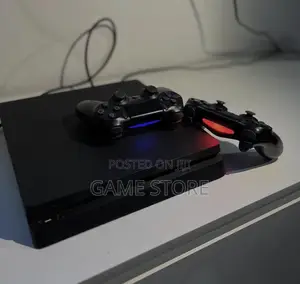 PS4 Slim Console with 12 Games & 2 Controllers