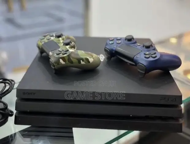 PS4 Pro Console with 12 Games & 2 Controllers - 1