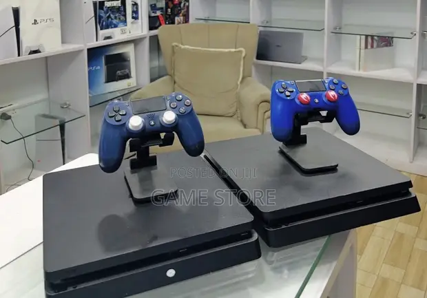 PS4 Slim Console with 12 Games & 2 Controllers - 1