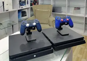 PS4 Slim Console with 12 Games & 2 Controllers