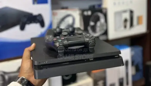 PS4 Slim Console with 12 Games & 2 Controllers - 1