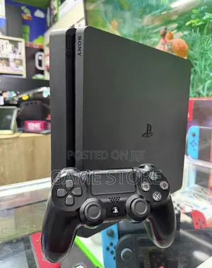 PS4 Slim Console with 12 Games & 2 Controllers