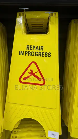 Repair in Progress Safety Sign Post