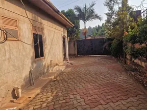 Guest House for Sale - 9 Self-Contained Rooms, Kitende