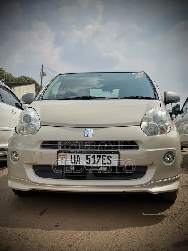 Toyota Passo 2014 Beige - 1