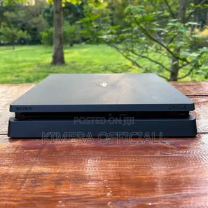 Sony PlayStation 4 Slim (500GB) - Jailbroken, 12 Games, 2 Controllers