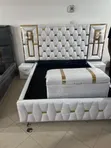 Modern Cream Upholstered Bed Set with Gold Accents - 1