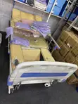 3-Crank Manual Hospital Bed with Wheels - 1