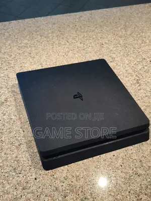 PS4 Slim Console with 12 Games & 2 Controllers