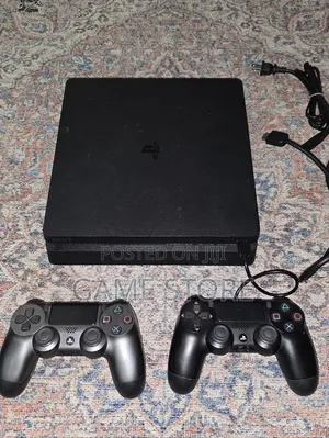PS4 Slim Console with 12 Games & 2 Controllers