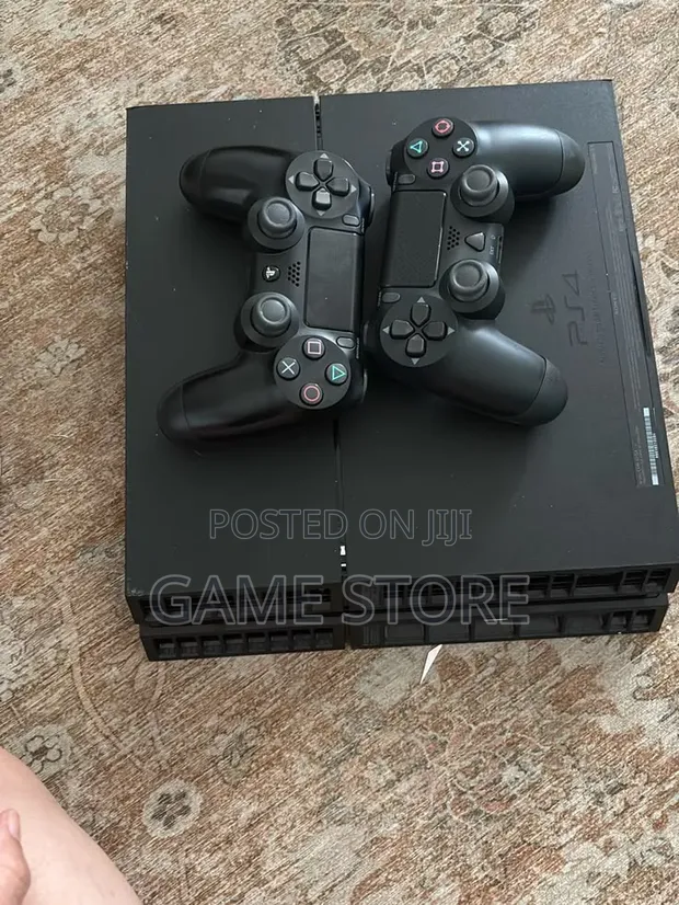 PS4 Standard Console with 12 Games & 2 Controllers - 1