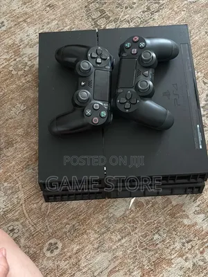 PS4 Standard Console with 12 Games & 2 Controllers