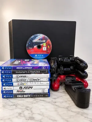 PS4 Pro Console with 12 Games & 2 Controllers