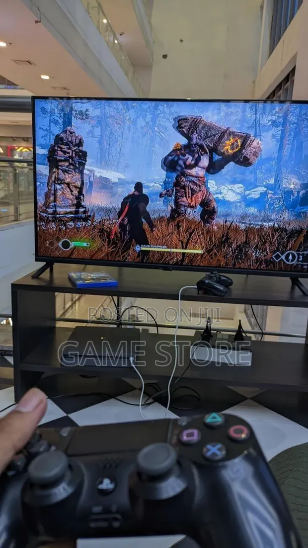 PS4 Slim Console with 12 Games & 2 Controllers - 1