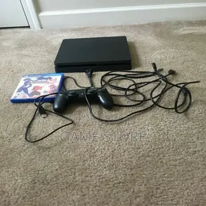 PS4 Slim Console with 12 Games & 2 Pads