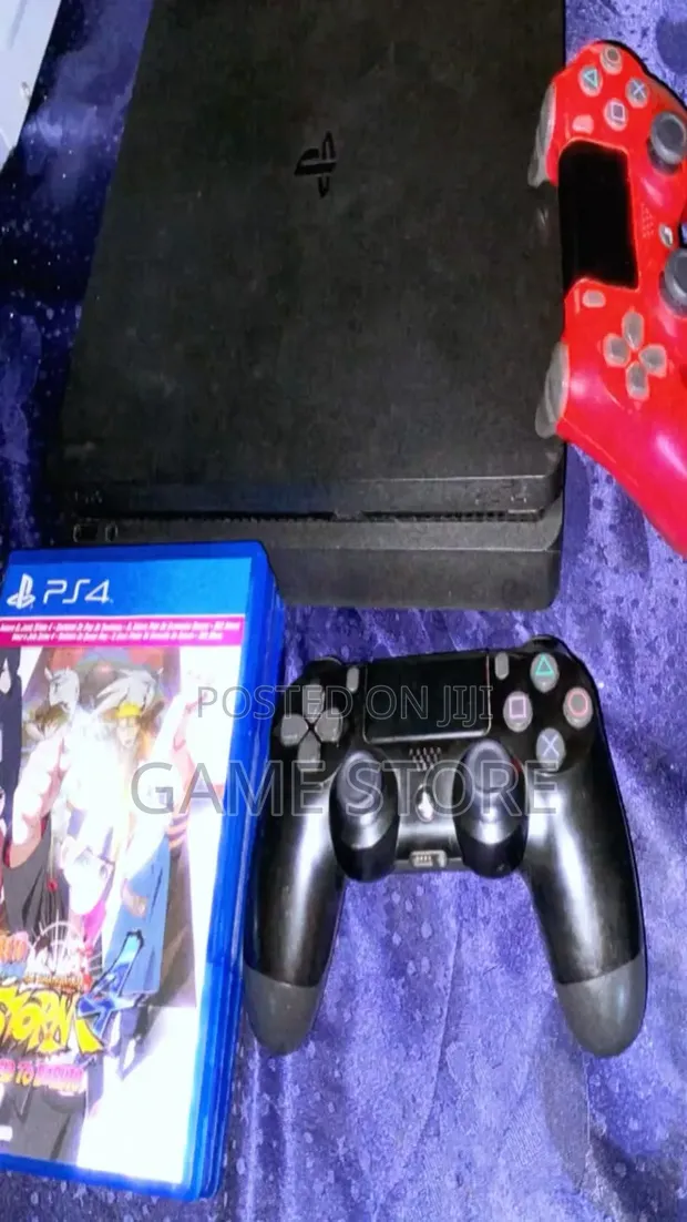 PS4 Slim Console with 12 Games & 2 Controllers - 1