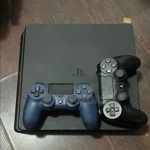 PS4 Slim Console with 12 Games & 2 Controllers