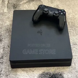 PS4 Slim Console with 12 Games & 2 Controllers