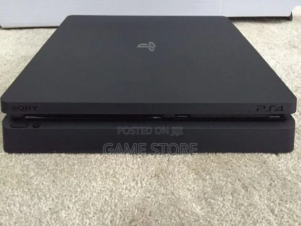 PS4 Slim Console with 12 Games & 2 Controllers - 1