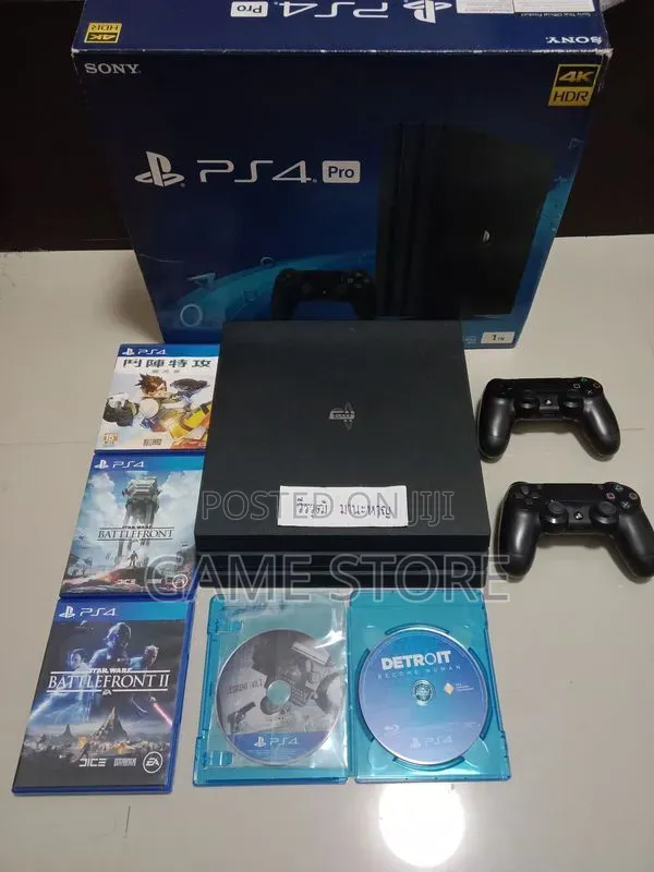 PS4 Pro Console with 12 Games & 2 Controllers - 1