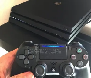PS4 Pro Console with 12 Games & 2 Controllers