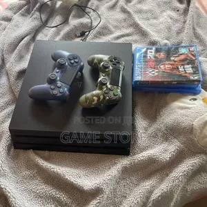 PS4 Pro Console with 12 Games & 2 Controllers