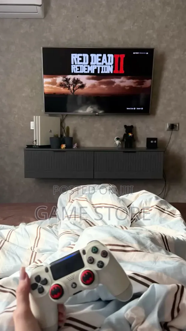 PS4 Pro Console with 12 Games & 2 Controllers - 1