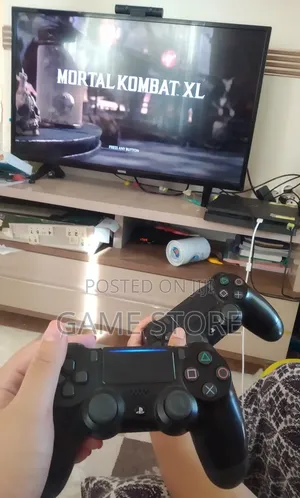 PS4 Slim Console with 12 Games & 2 Controllers