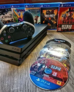 PS4 Pro Console with 12 Games & 2 Controllers