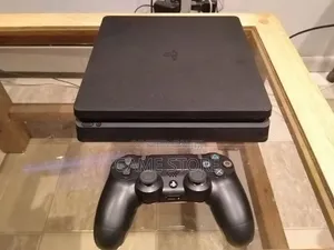 PS4 Slim Console with 12 Games & 2 Controllers