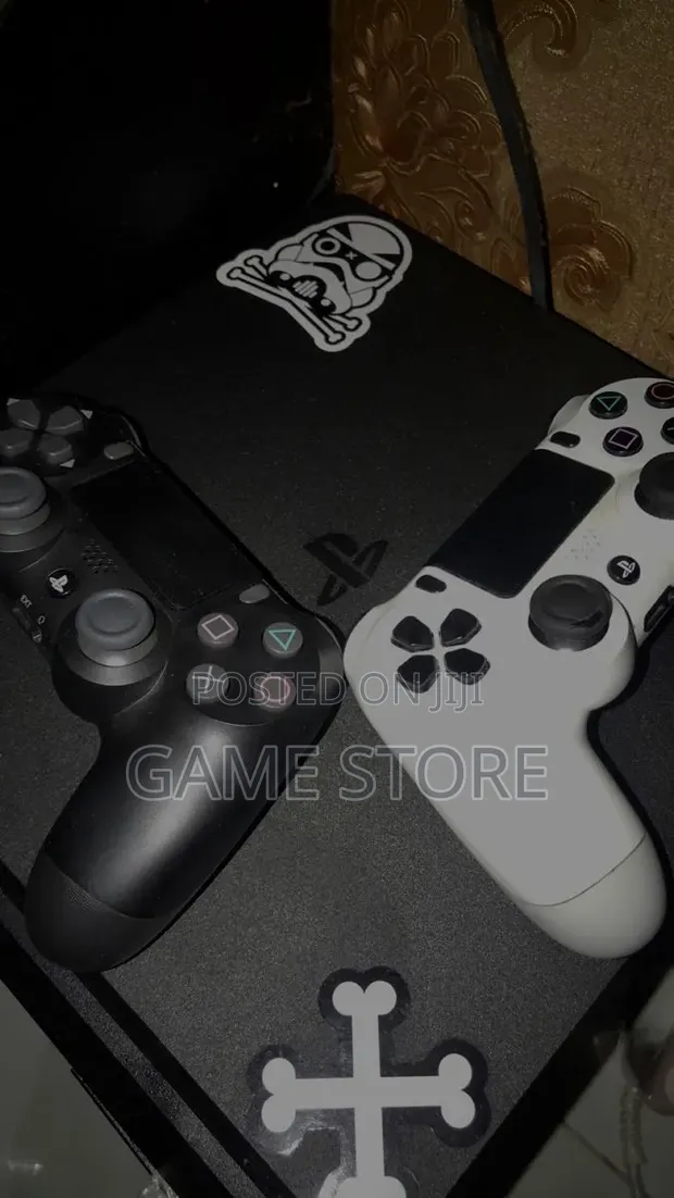 PS4 Slim Console with 12 Games & 2 Controllers - 1