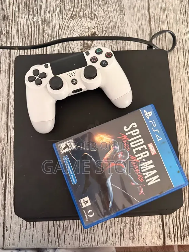 PS4 Slim Console with 12 Games & 2 Controllers - 1