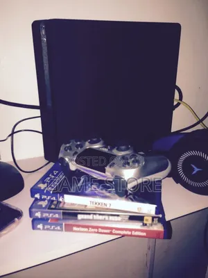PS4 Slim Console with 12 Games & 2 Controllers