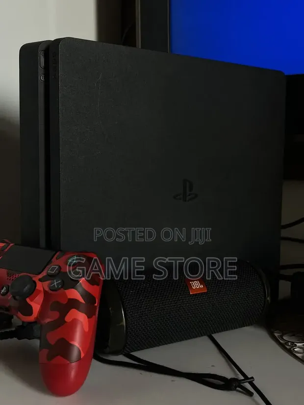 PS4 Slim Console with 12 Games & 2 Controllers - 1