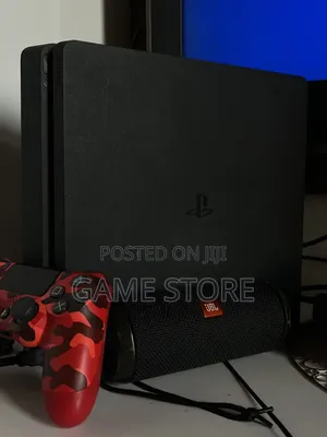 PS4 Slim Console with 12 Games & 2 Controllers