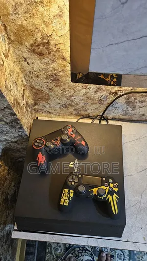 PS4 Pro Console with 12 Games & 2 Controllers