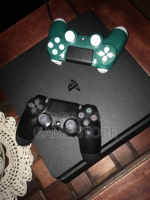 PS4 Slim Console with 12 Games & 2 Pads - 1