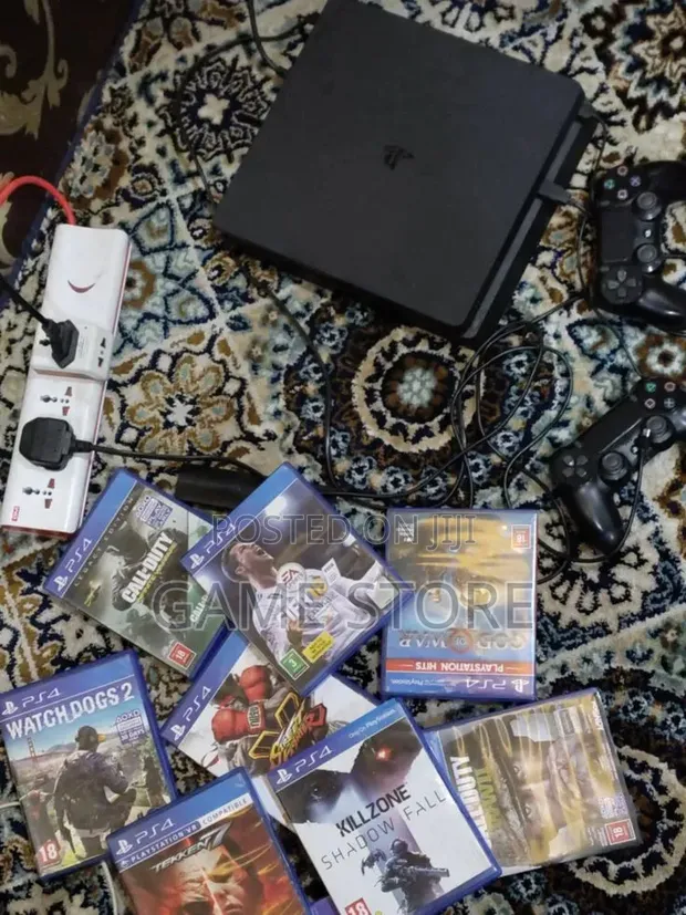 PS4 Slim Console with 12 Games & 2 Controllers - 1