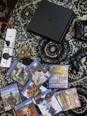 PS4 Slim Console with 12 Games & 2 Controllers