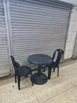 Elegant Black Plastic Bistro Table and Chairs - 4