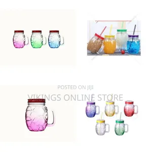 New Design Colored Spraying 500ml Football Shape Glass Mason Jar