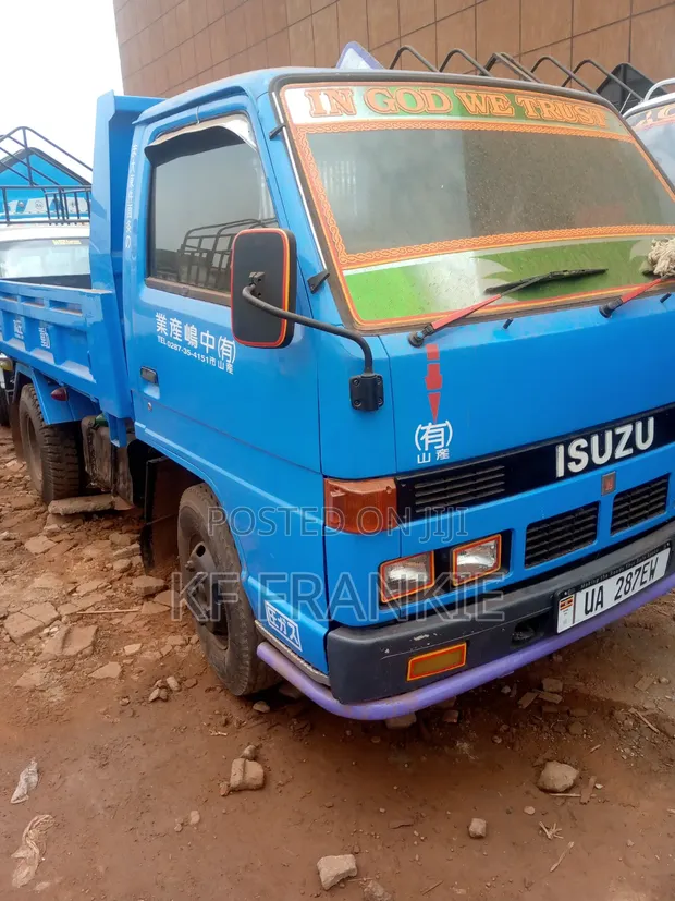 Isuzu Elf Tipper Truck - 1